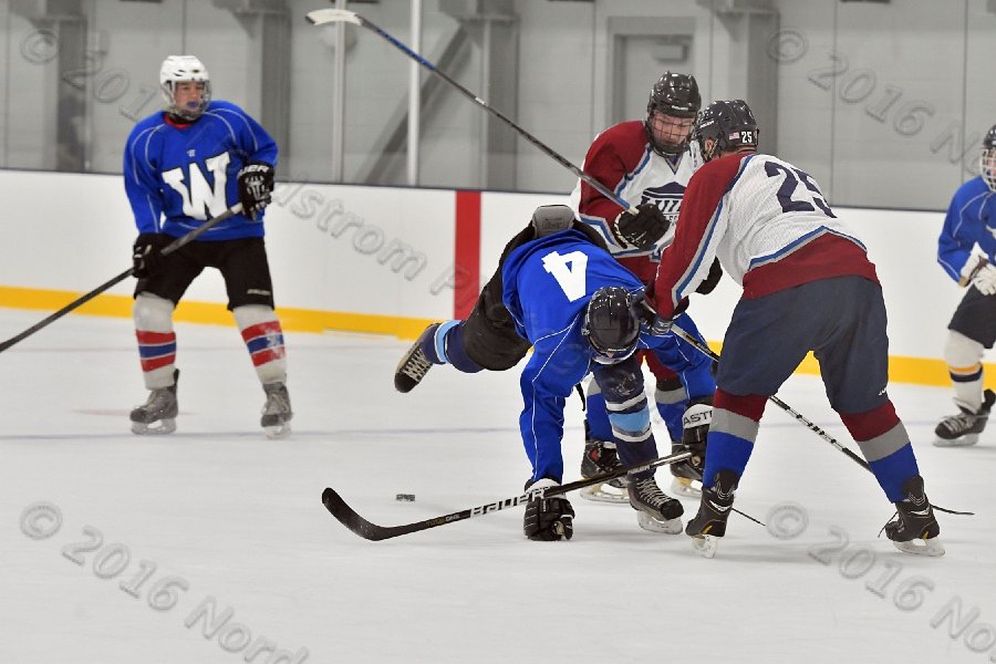 Wheaton College Men\'s Ice Hockey vs Middlesex Community College. - Photo By: KEITH NORDSTROM